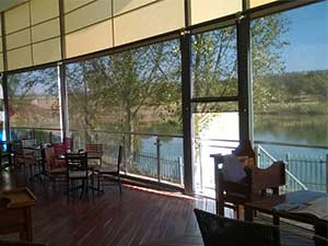 Transparent roller blinds from inside Antonnio's